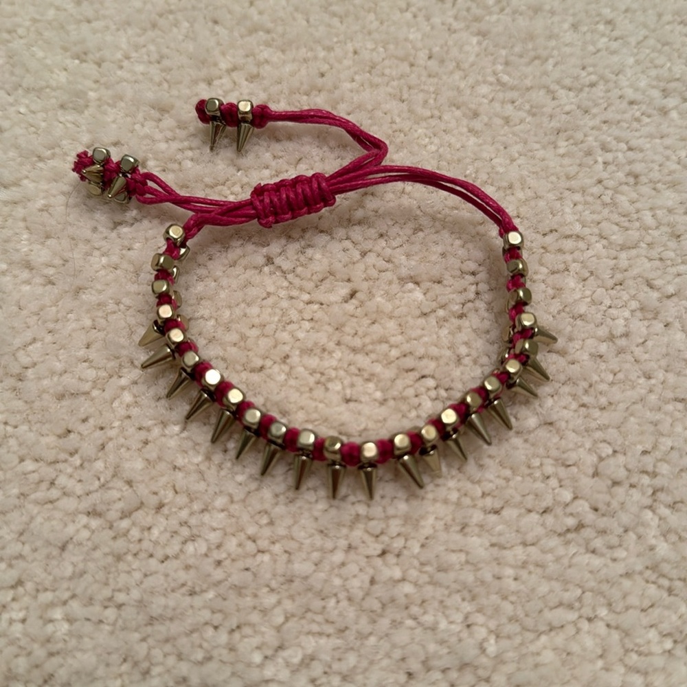 BCBGeneration hot pink string bracelet with gold spikes